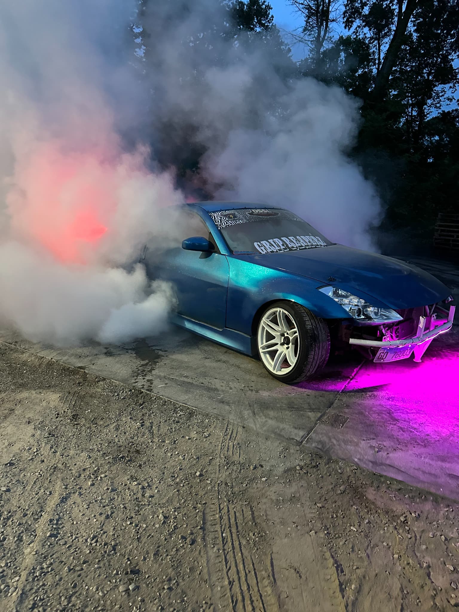 GripReaperz blue 350Z doing a burnout